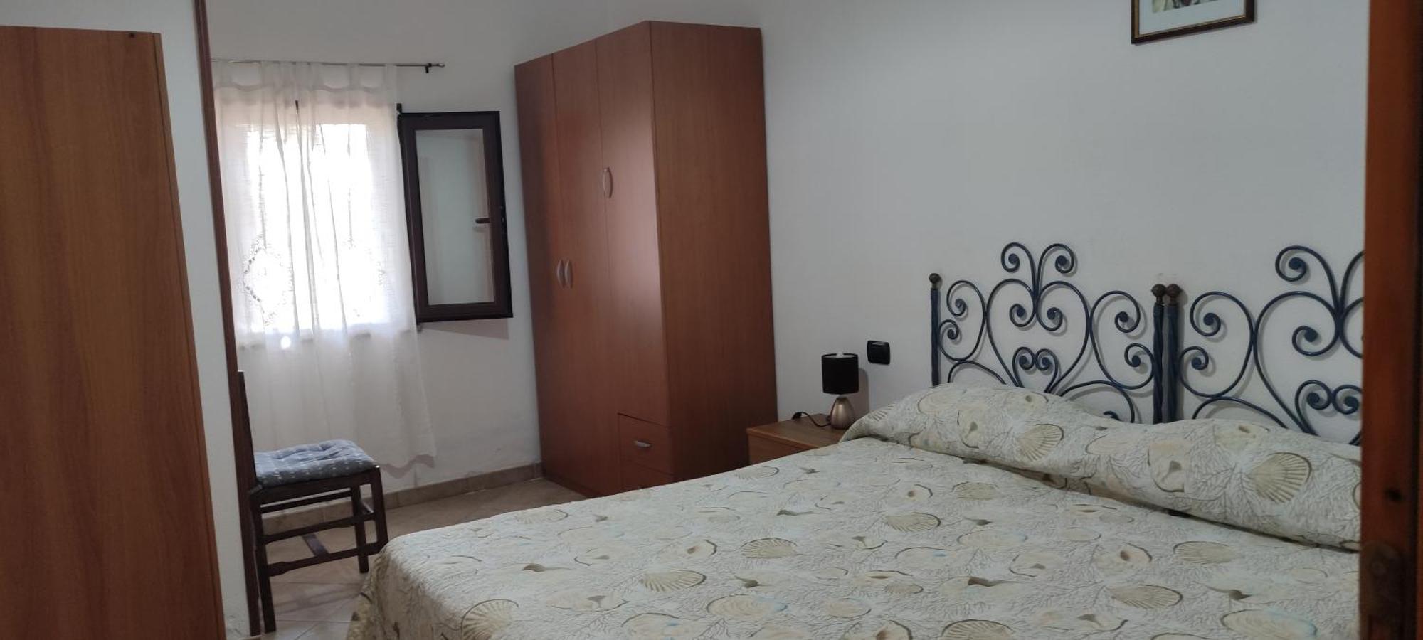 Casa Purple Apartment Кала Гононе Стая снимка